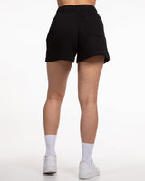 The Womens Sweat Shorts - Black - Pilates Powerhouse - Bottom Left Leg - Printed - White