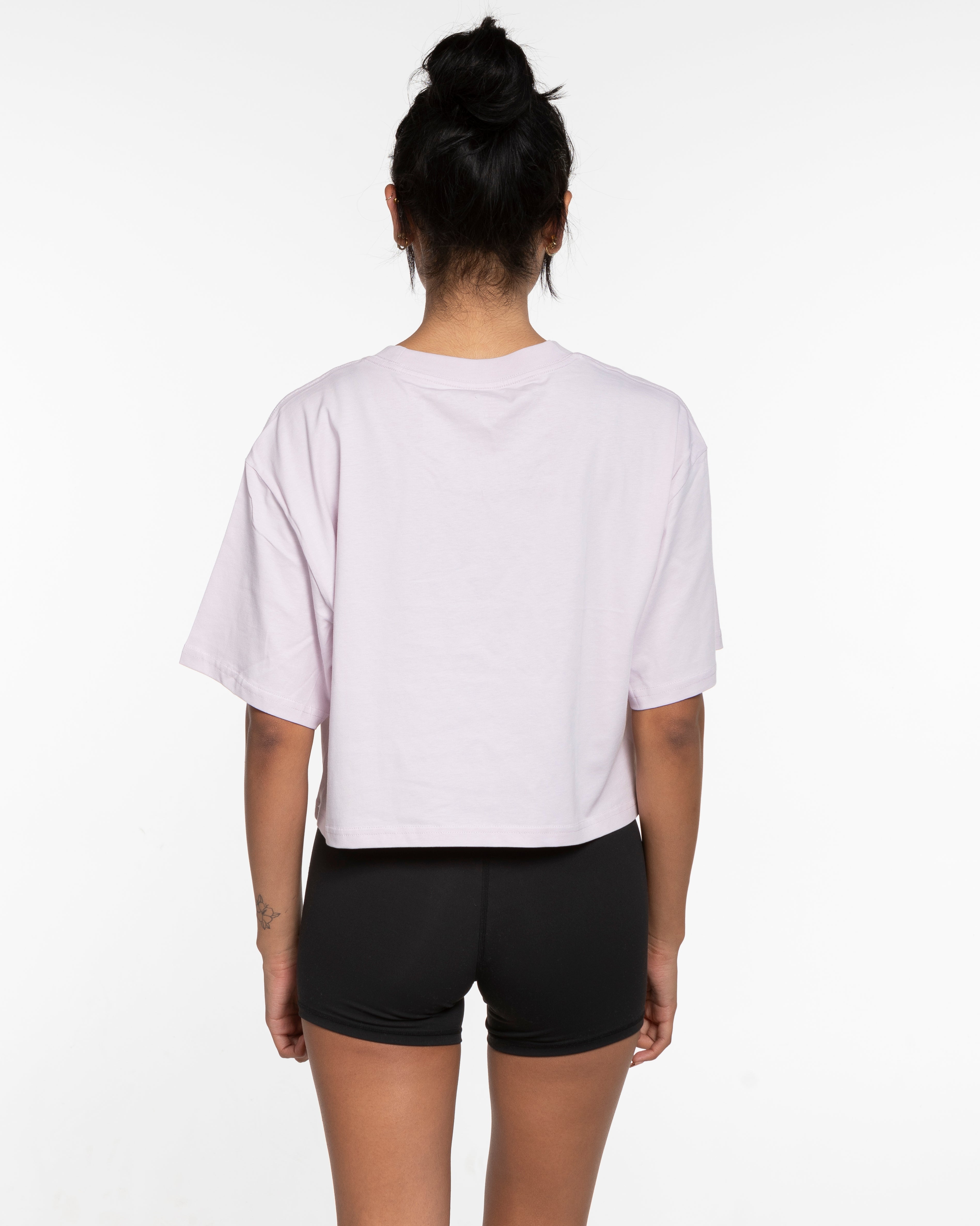 The Oversized Crop Tee - Orchid - Movement Pilates Buffalo - Center Chest Stacked - Printed - Black