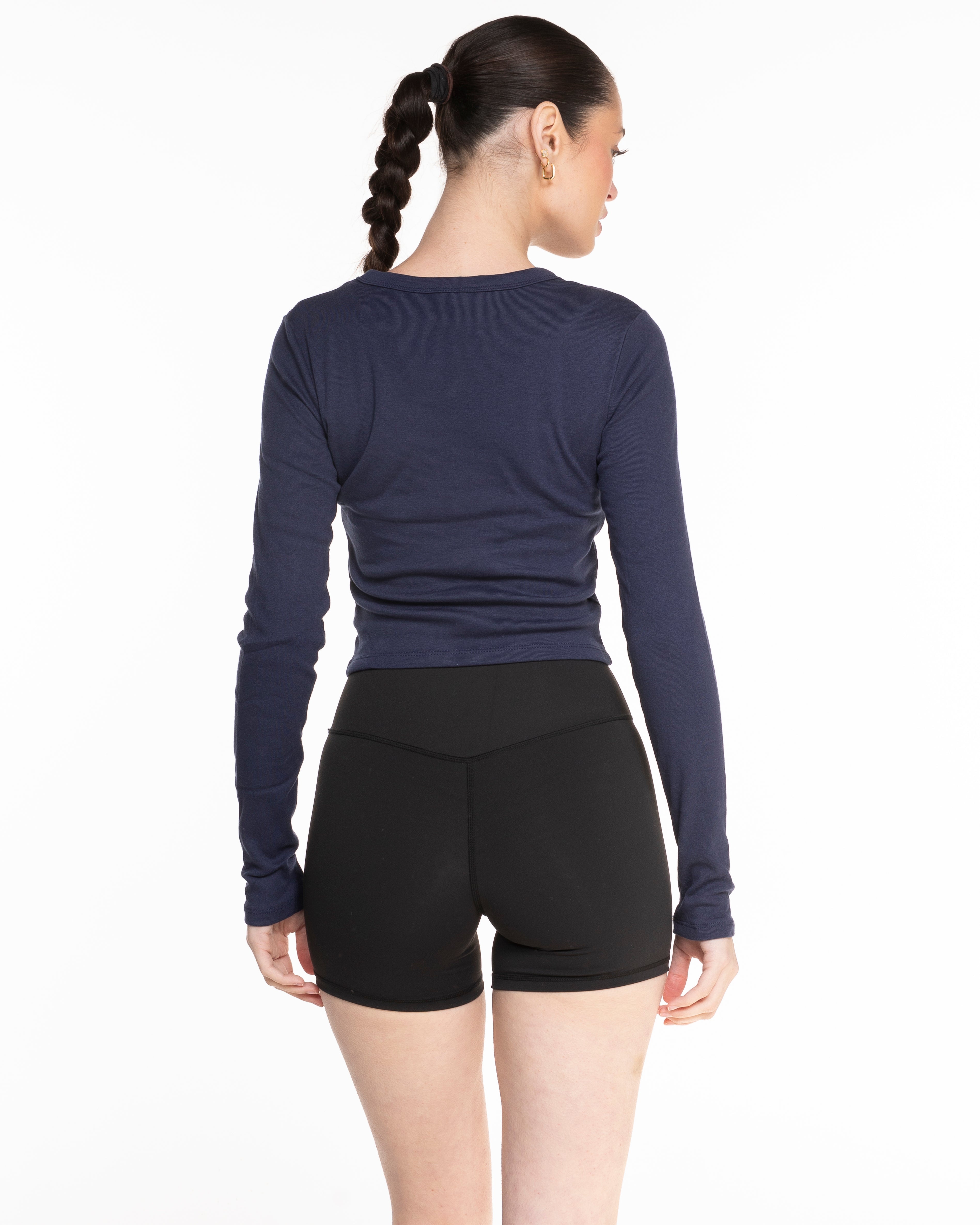 The Micro Rib Crop Long Sleeve - Navy - Pilates Plus PB - Center Chest Stacked & Right Wrist - Printed - Butter