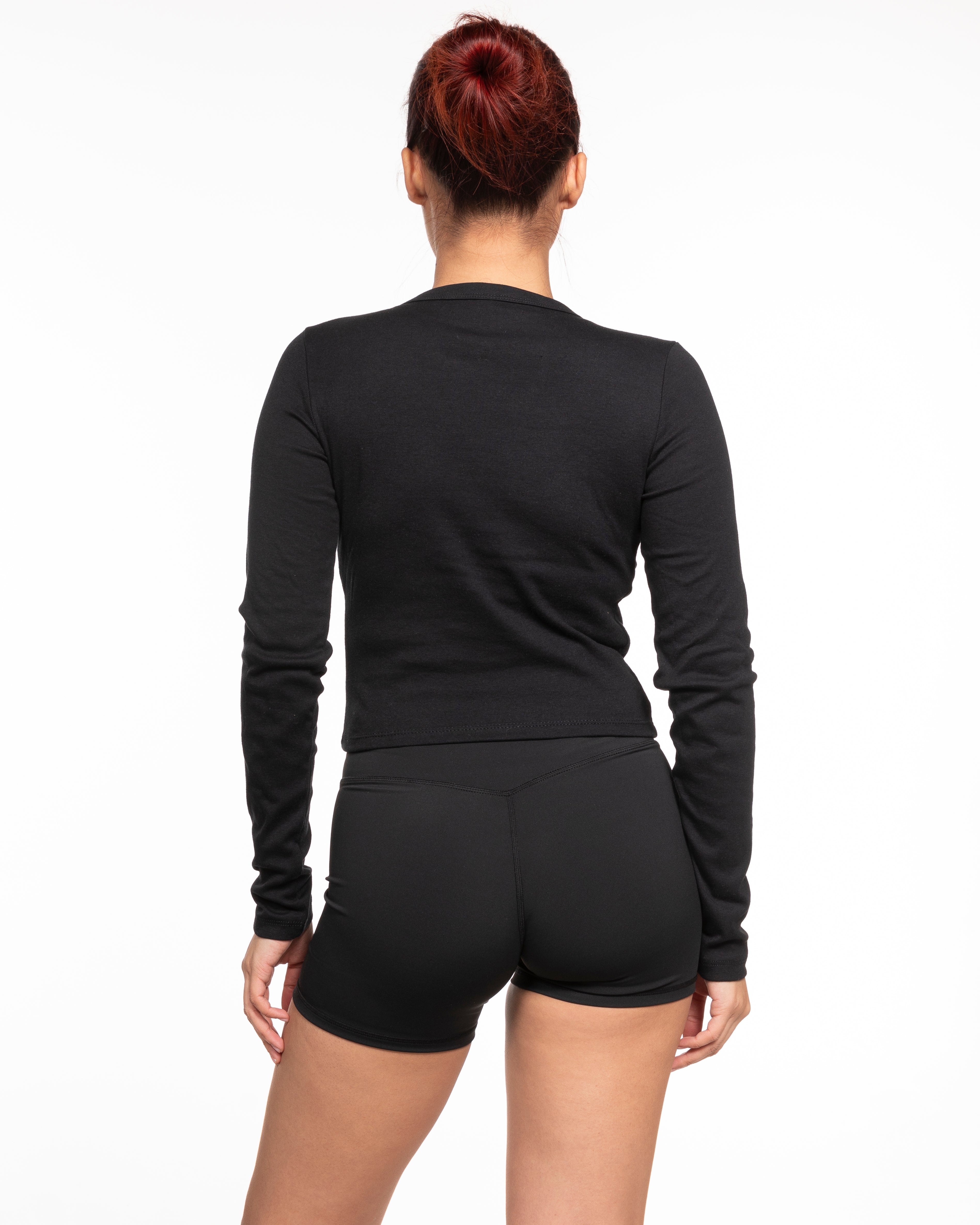 The Micro Rib Crop Long Sleeve - Black - Training Club - Center Chest Stacked - Printed - White