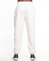 The Mens Sweatpants - Bone - Luma Wellness - Left Leg Stacked - Embroidered - Tone on Tone