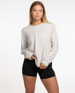 The Womens Heavyweight Long Sleeve - Washed Bone - Ethos Q4 Photoshoot - Front Right Bottom - Embroidered - Maroon