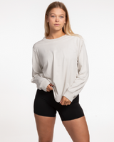 The Womens Heavyweight Long Sleeve - Washed Bone - Ethos Q4 Photoshoot - Front Right Bottom - Embroidered - Maroon