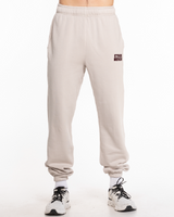 The Mens Sweatpants - Washed Bone - Ethos Q4 Photoshoot - Left Leg - Embroidered - Maroon