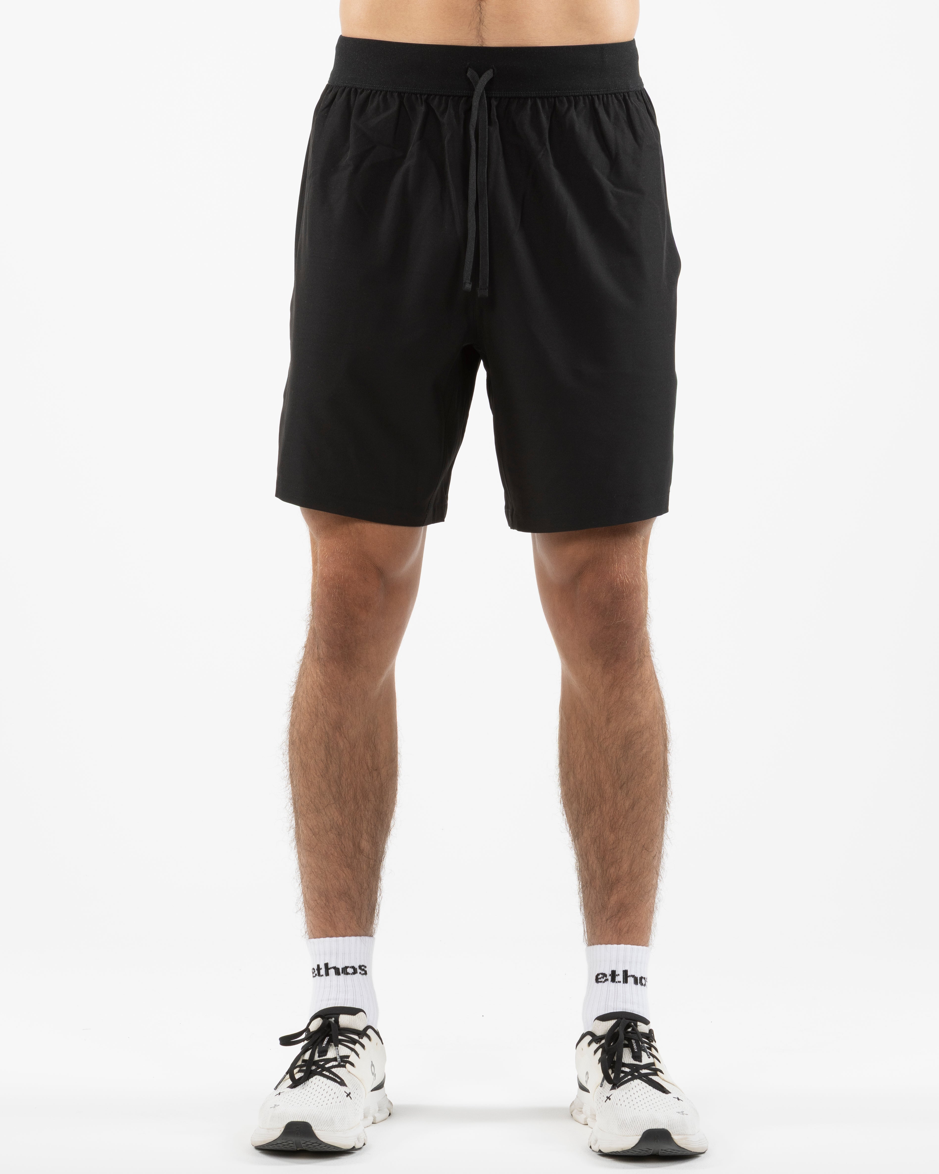 The Mens Active Short  - Black - The Platform Studio - Left leg & Bottom Right - Printed - White