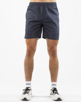 The Mens Beach Short - Petrol Blue - Rush Cycle Studio - Left Leg Stacked - Printed - Full Color