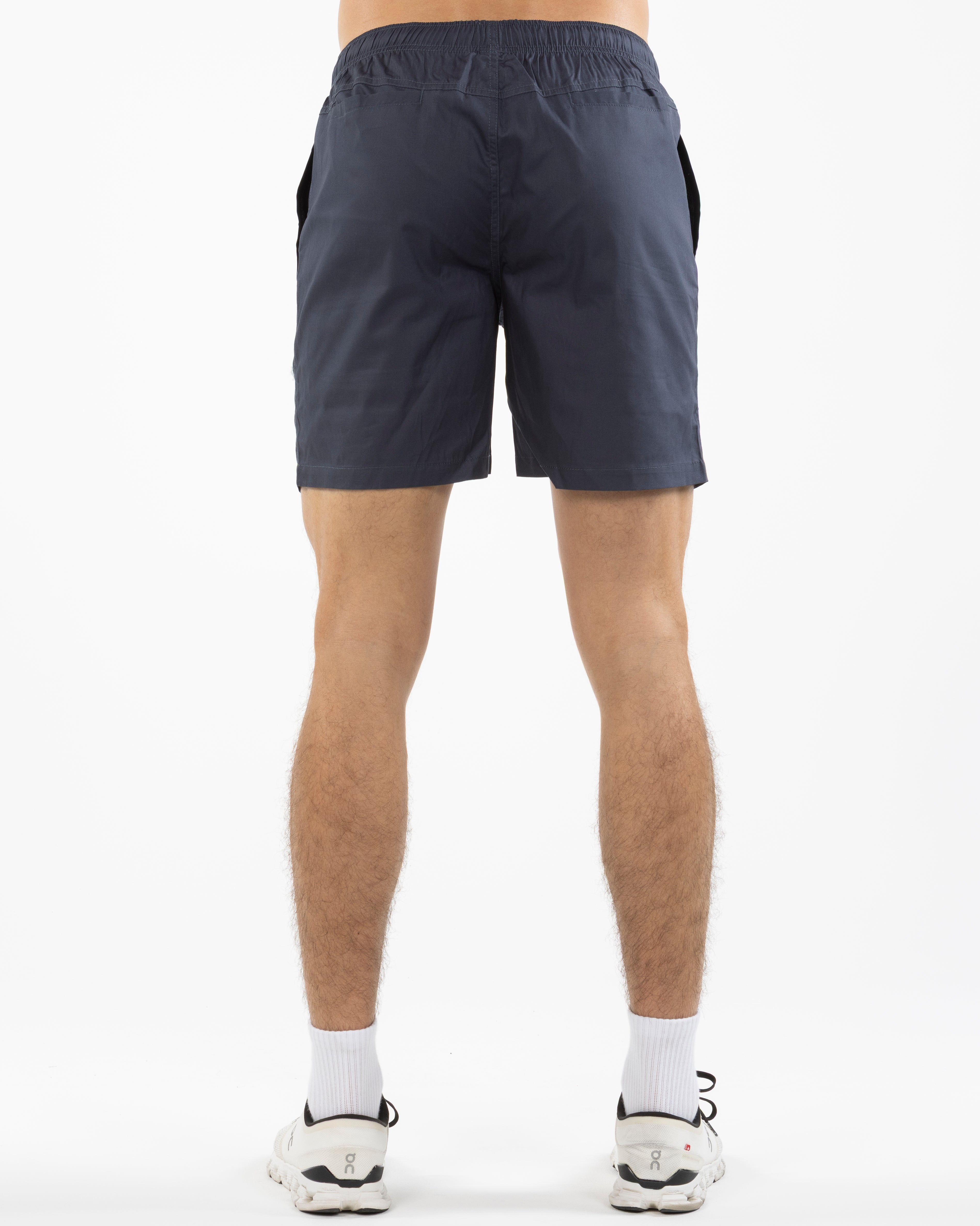 The Mens Beach Short - Petrol Blue - Rush Cycle Studio - Left Leg Stacked - Printed - Full Color