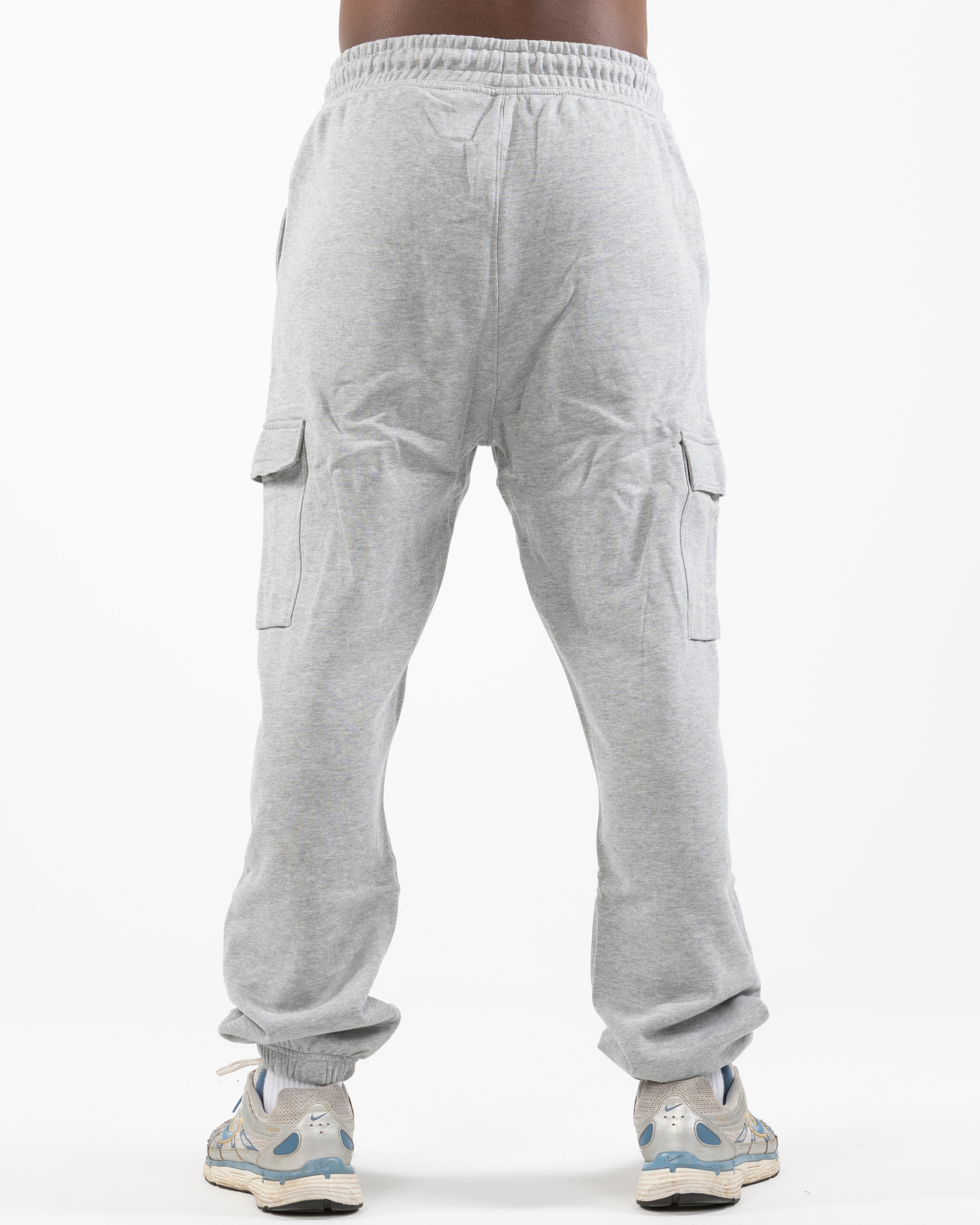 The Cargo Jogger - Heather - Movement Pilates Buffalo - Left Leg Stacked - Printed - Black
