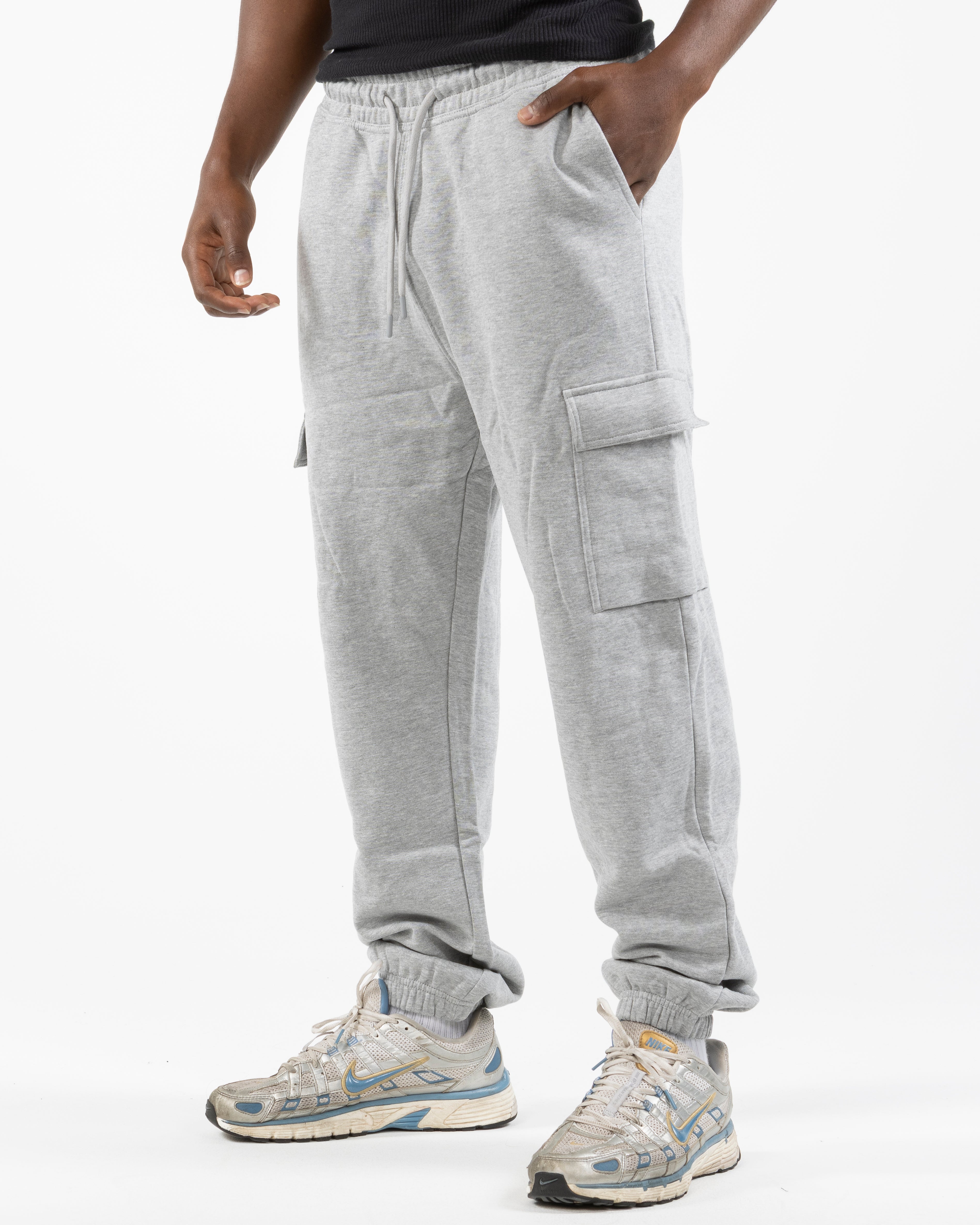The Cargo Jogger - Heather - Movement Pilates Buffalo - Left Leg Stacked - Printed - Black