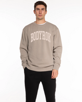 The Midweight Unisex Crewneck - Washed Cement - Varsity 2026 - Center Chest - Printed - Lighter Cement