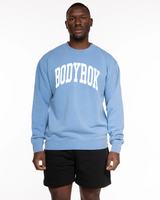 The Midweight Unisex Crewneck - Washed Light Blue - Varsity 2026 - Center Chest - Printed - White
