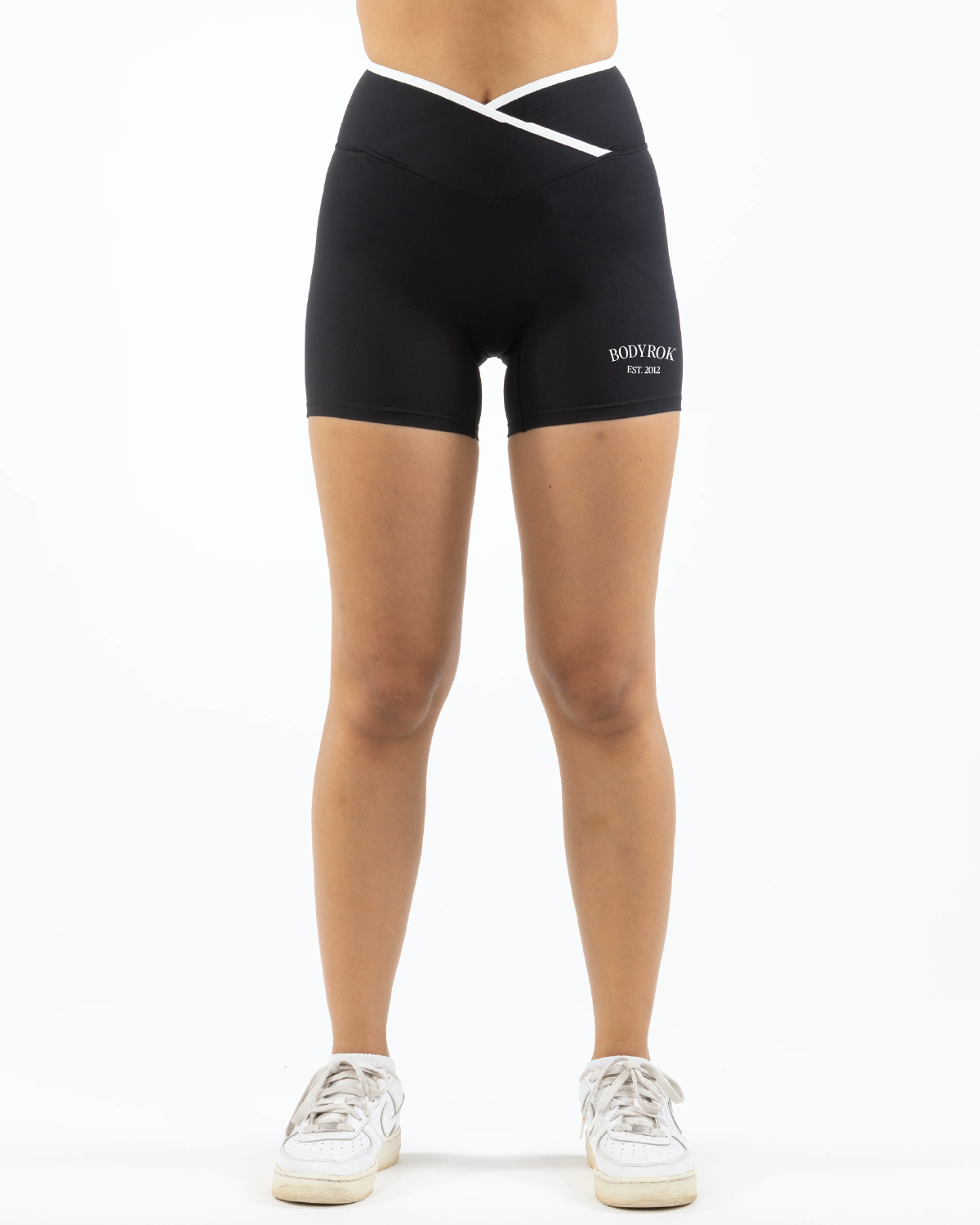 The Piped Crossover Short - Black - Summer 2026 - Front Bottom Left - Printed - White