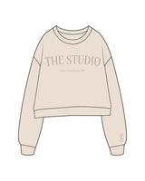 The Studio Crop - Latte - The Studio Cape - Center Chest Stacked -  Left Wrist - Printed - Tone on Tone