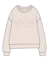 The Midweight Unisex Crewneck - Washed Ivory - Abode Skin & Wellness - Center Chest Stacked - Printed - Tone on Tone