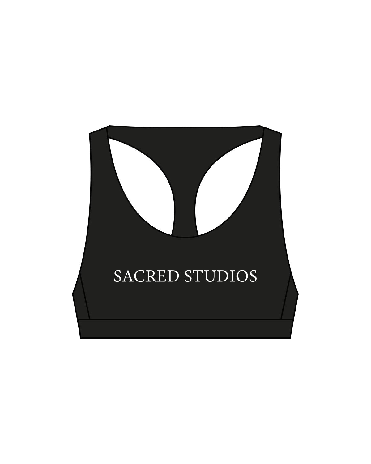 The Racer Bra - Black - Sacred Studios - Center Chest - Printed - White