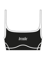 The Piped Scoop Sports Bra - Black - RECHARGED PILATES - Center Chest - Printed - White