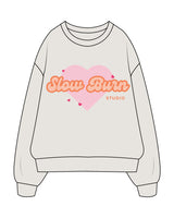 The Womens Crewneck - Washed Bone - Slow Burn - Center Chest Stacked - Full Color