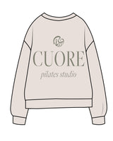 The Midweight Unisex Crewneck - Washed Ivory - Cuore Pilates Studio - Center Chest & Left Wrist - Back Stacked - Printed - Cypress