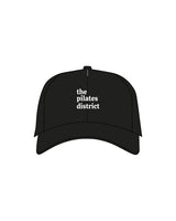 The Dad Hat - Black - THE PILATES DISTRICT - Front Stacked Words - Embroidered - White