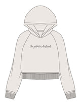 The Womens Crop Hoodie - Bone - THE PILATES DISTRICT - Center Chest - Printed - Black