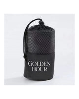 The Gym Towel - Black - Golden Hour Pilates - Left Vertical Text - Embroidered - White - The Gym Towel Bag - Black - Center Stacked - Printed White