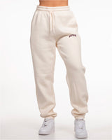 The Womens Classic Sweatpants - Off White - BODYROK Employee - Left Leg - Bordeaux - (Windsor Wine - Pantone 19-1528 TCX)