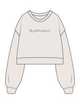 The Womens Crop Crewneck - Bone - THE PILATES DISTRICT - Center Chest - Printed - Black