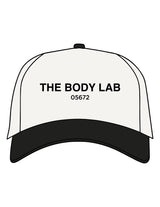 The Canvas Cap - Natural / Black - Body Lab - Center Crown Stacked - "05672" - Embroidered - Black - "The Body Lab" - Puff Embroidered - Black