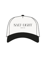 The Canvas Cap - Natural / Coal- Salt + Light Hair Co - Center Chest Stacked -  ‘SALT + LIGHT’ - Black Puff Embroidered -  'Hair Co.’ - Black Flat Embroidered